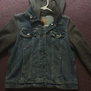 Ripped Hollister jean jacket with gray sleeves